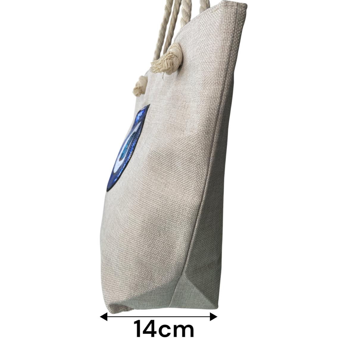 Conjunto de Canga de Praia com Franja e Bolsa de Praia Olho Grego com detalhe em Paetê